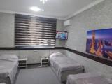 Bed in Dorm with courtyard view