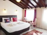 Standard Quadruple room with balcony and with city view