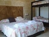 Standard Quadruple room with garden view