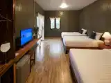 Standard Quadruple room with garden view