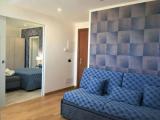 Standard Quadruple room with garden view