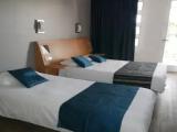 Standard Triple room with partial sea view