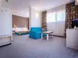 Quadruple Family Suite with balcony and with partial sea view