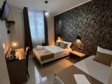 Standard Triple room with city view