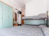 Classic Quadruple room with balcony and with partial sea view