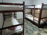 Bed in Dorm with courtyard view