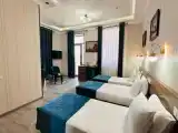 Standard Triple room with city view