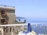 Connecting Quadruple room with balcony and Partial Sea View