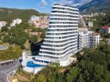 2 Bedrooms Quadruple Family Apartment with balcony and with partial sea view