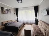 Standard Triple room with garden view