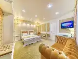 Quadruple Junior Suite with jacuzzi and sauna
