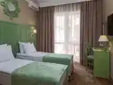 The First Category Twin room with balcony