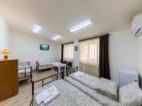 Standard Quadruple room with city view