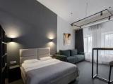 Double Duplex Suite with sofa with kitchen with city view