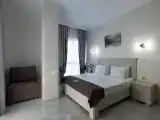 Deluxe Triple room with city view