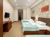 Standard Triple room with courtyard view