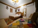 Standard Triple room with garden view