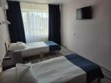 Standard Triple room with balcony and with courtyard view