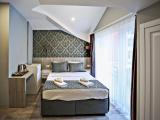 Deluxe room with balcony and with city view