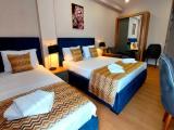 Superior Quadruple Family Suite with city view