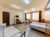 Deluxe Quadruple room with city view