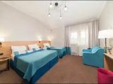 Standard Triple room with balcony and with city view