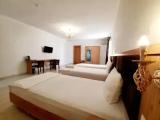 Bed in Dorm with courtyard view