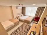 Standard Triple room with sea view