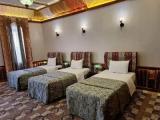 Standard Triple room with courtyard view