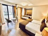 Family room with balcony and with city view