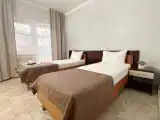 2 rooms Quadruple room with balcony