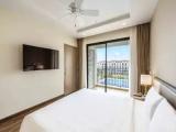 Family room with balcony and with pool view