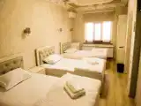 Superior Triple room with balcony and with city view