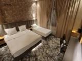 Deluxe Triple Family room with city view