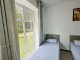 Bed in Dorm with courtyard view
