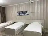 Standard Triple room with courtyard view
