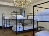 Bed in Dorm (male dorm) with balcony and with garden view