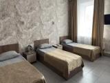 Standard Quadruple room with courtyard view