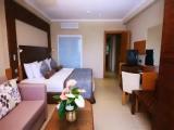 Family room with balcony and with land view