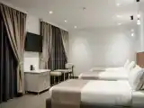 Triple Junior Suite with courtyard view