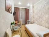 Comfort room with balcony and with city view
