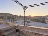 Terrace room with sunset view