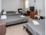 Standard Quadruple room with courtyard view