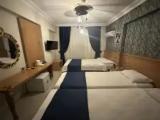Superior Quadruple room with city view