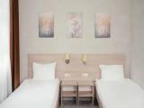 Standard Quadruple room with courtyard view