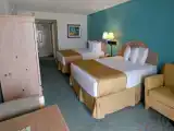 Standard Quadruple Basement room with partial ocean view