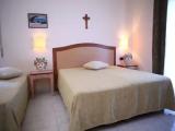 Standard Triple room with partial sea view