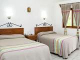 Standard Quadruple room with garden view