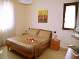 Standard Quadruple room with garden view