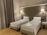 Family Quadruple room with garden view